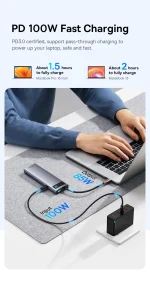 Baseus 11-in-1 Type-C hub plugged into a laptop on a work desk